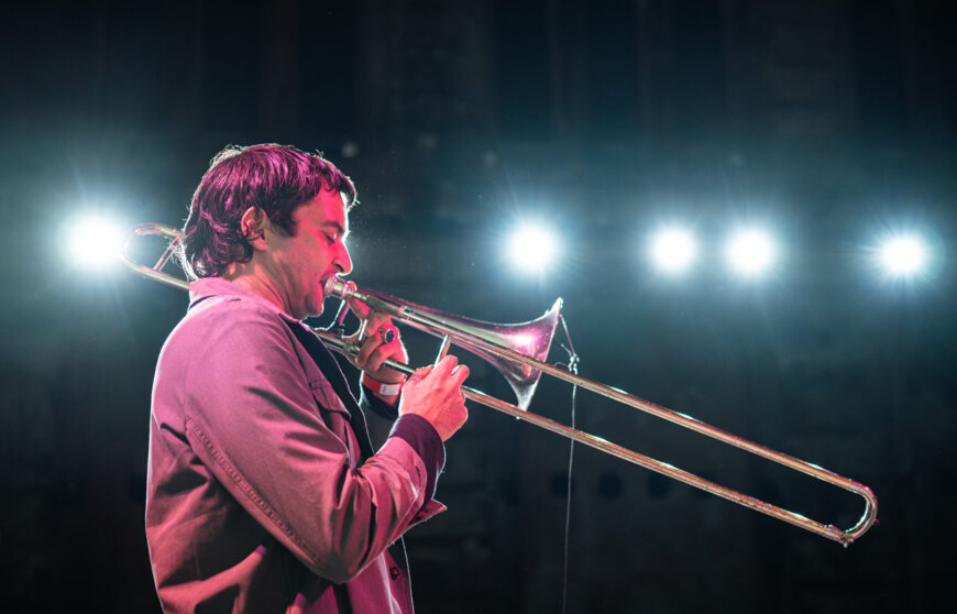 Il trombonista Gianluca Petrella durante un concerto notturno alle Ogr a Torino