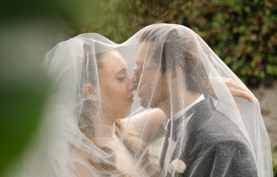 a bride and a groom spontaneously poses during their wedding at villa kimera, italy